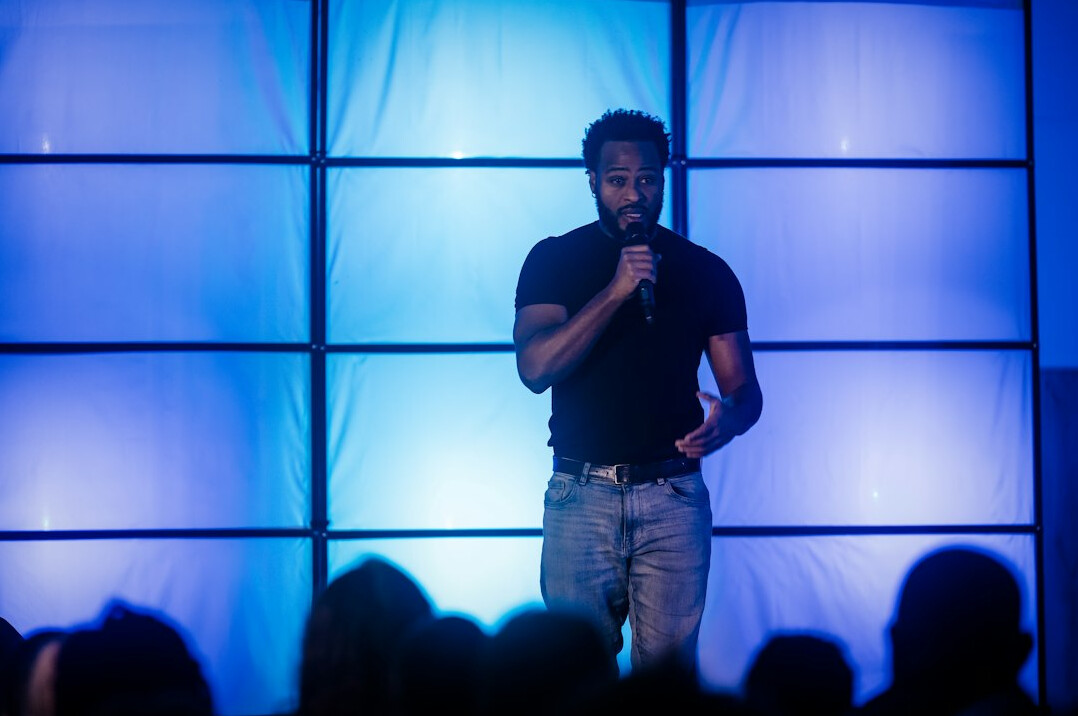 executive leader speaking on stage