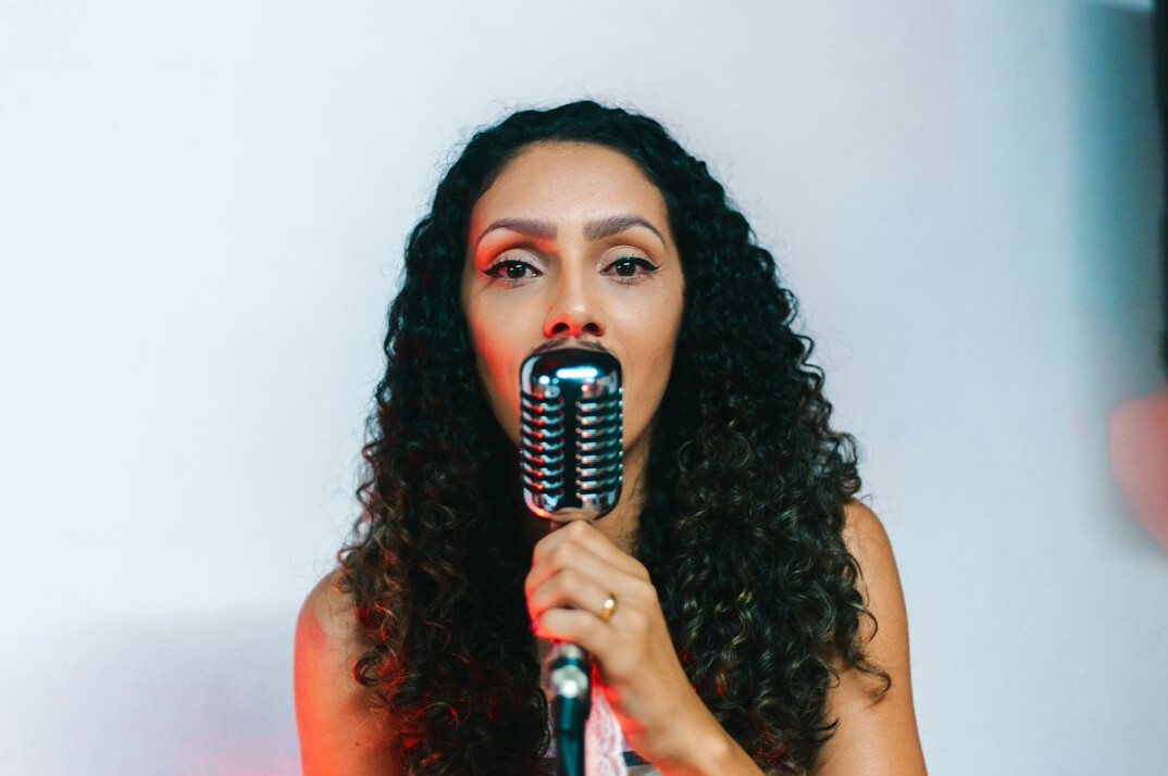 woman practicing voice exercises