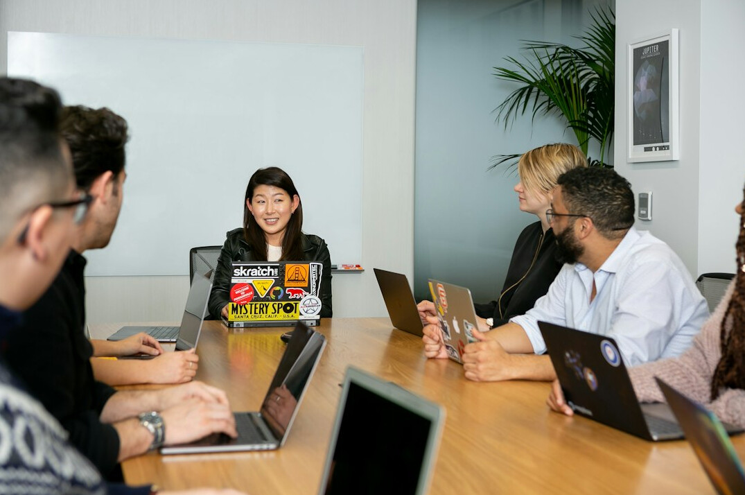 woman leading team meeting
