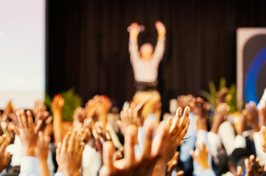 business leader presenting on stage
