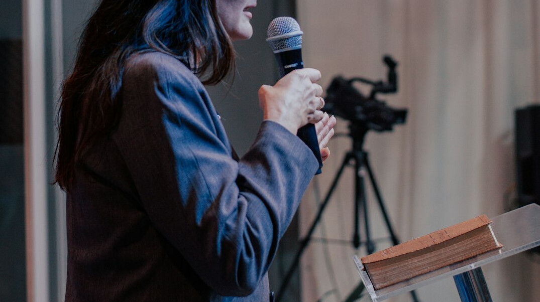woman doing voice exercises